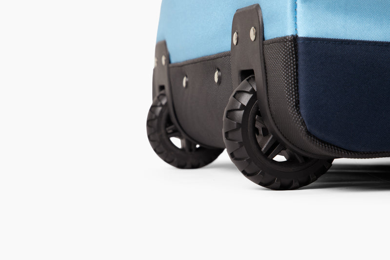 Wheels on blue wolfpack travel bag 